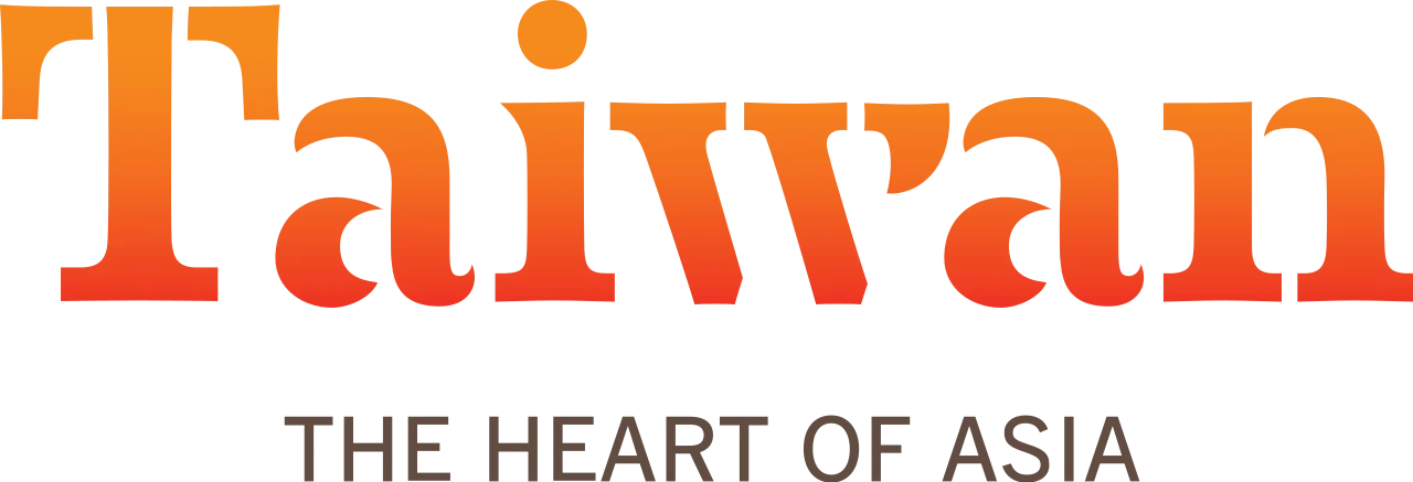 橘紅漸層字樣「Taiwan」，下方附上 The Heart of Asia 標語，呈現國家觀光識別設計。 此標誌象徵台灣官方觀光推廣形象，常用於旅遊品牌合作與國際宣傳活動，提升網站的專業與可信度。